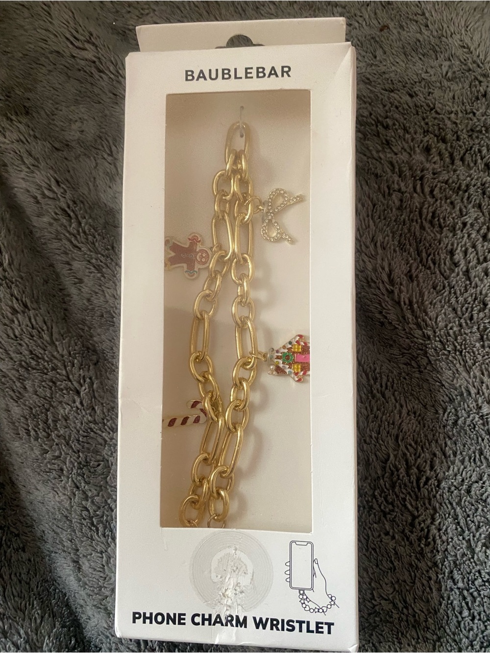 BaubleBar Gold Chain Phone Charm Wristlet with Holiday Charms